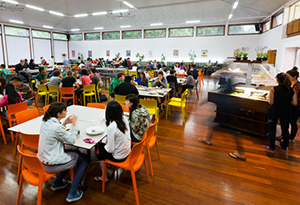 The Dining Hall filled with residents at tables enjoying their meal