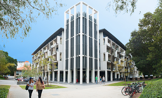 The external view of the new building of University Hall with students walking to class.