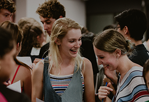 Students laughing together during an activity