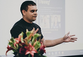 Indigenous resident presenting welcome to country at leadership event